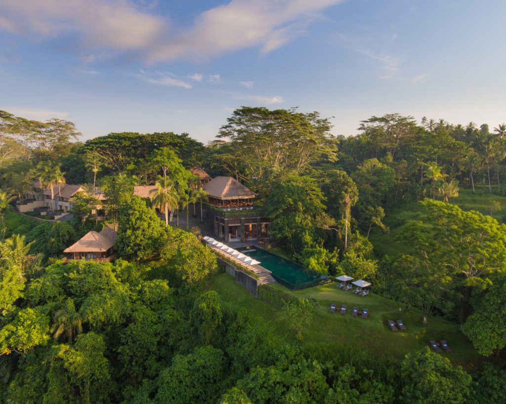 Exterior shot of Alila Ubud in lush greenery setting.