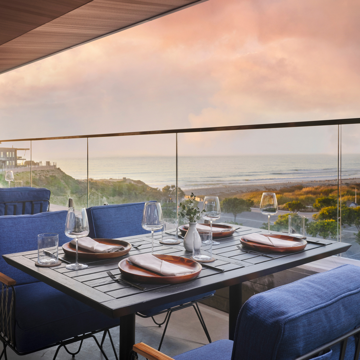 Table on vaga terrace looking out onto the ocean