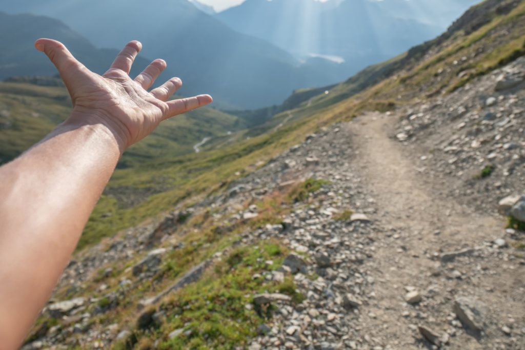 hand extended over trail views