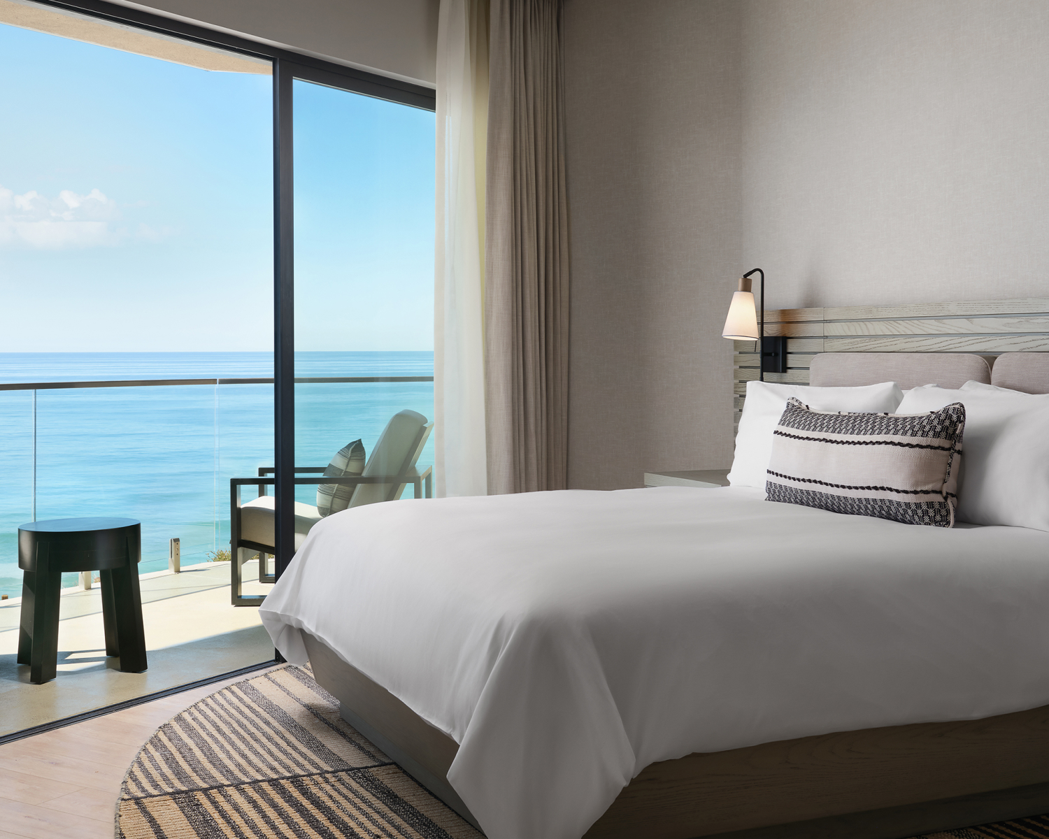 room with king bed and ocean views