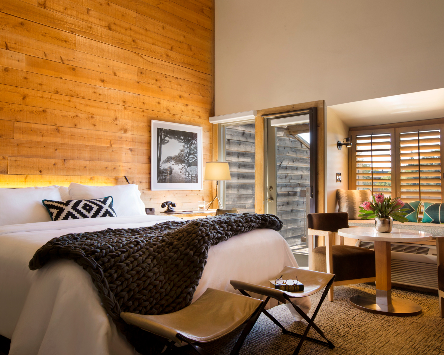 bedroom with wooden wall decor
