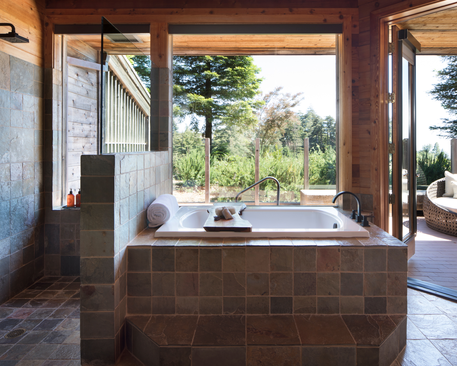 tub with a forest view