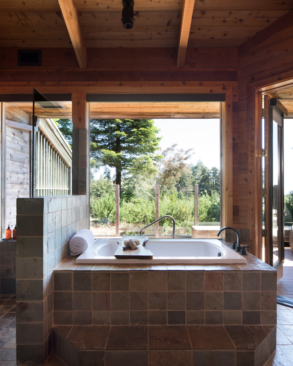 tub with a forest view