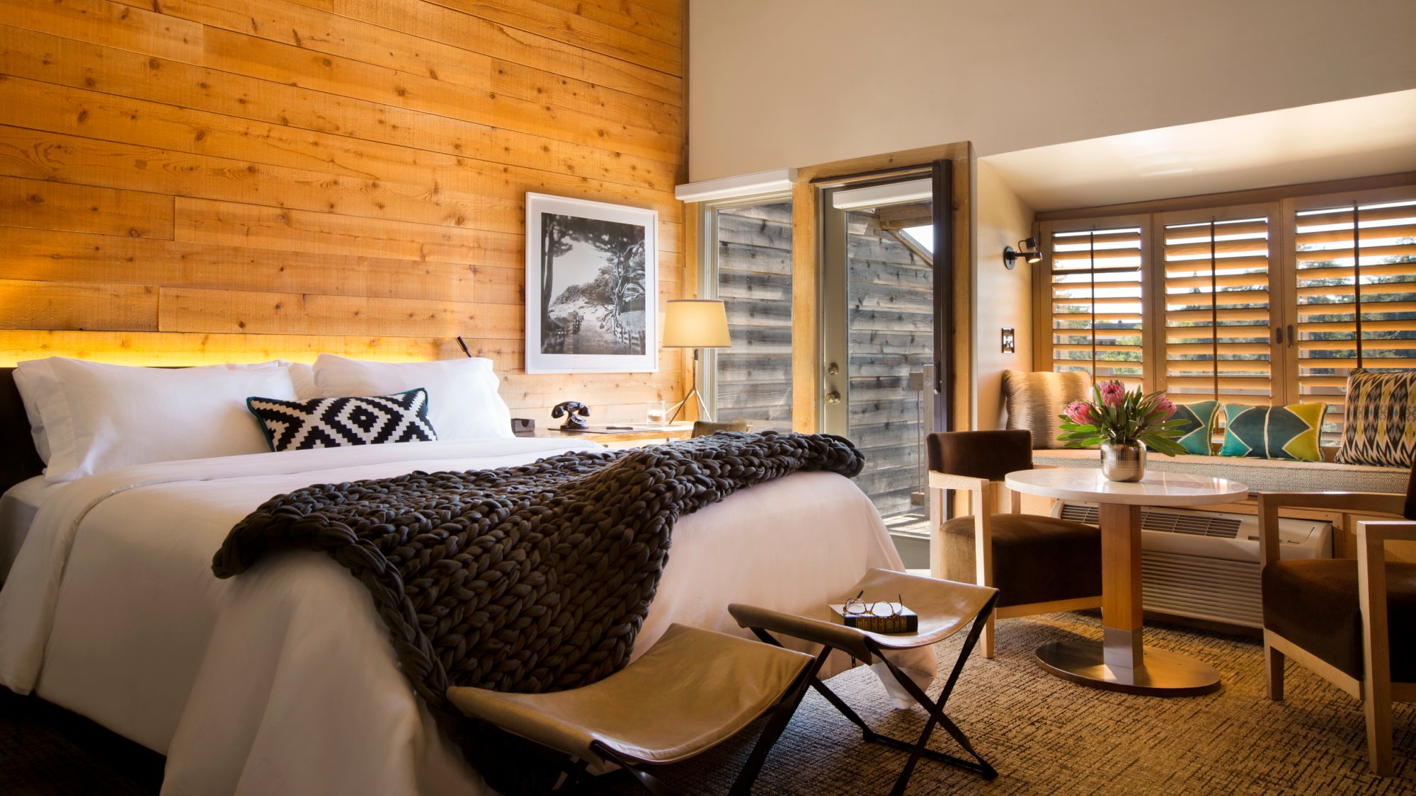 bedroom with wooden wall decor