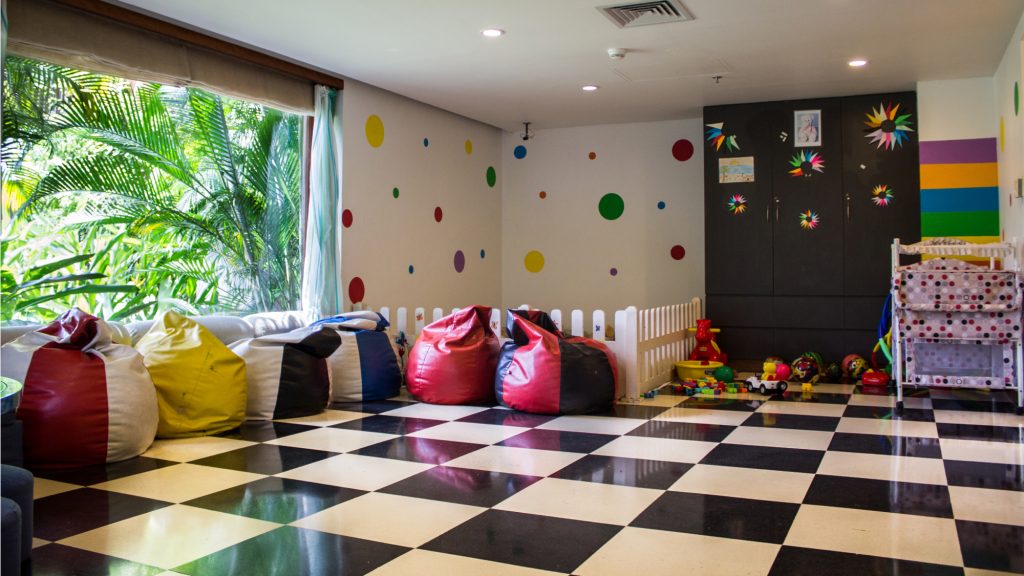 playroom with bean bags and checkered floor
