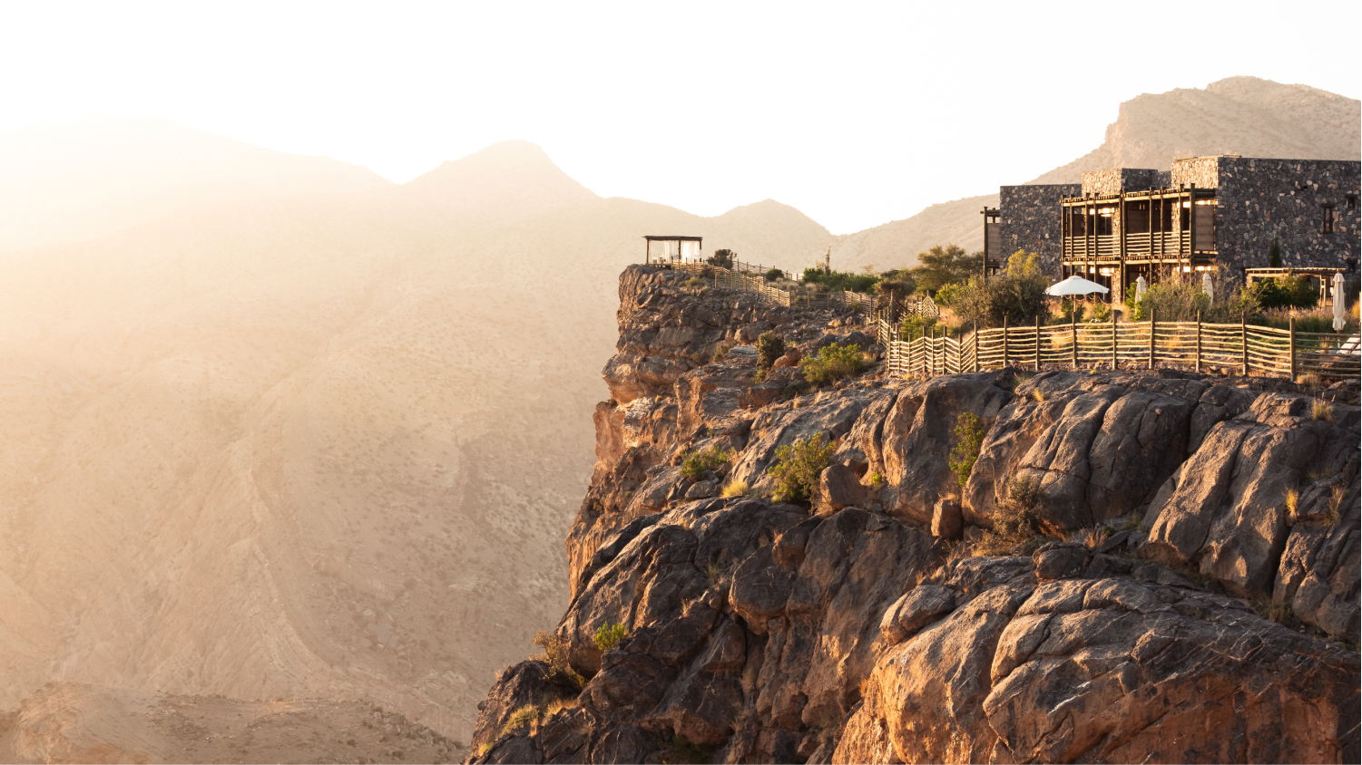 views of the resort and cliffs at sunset