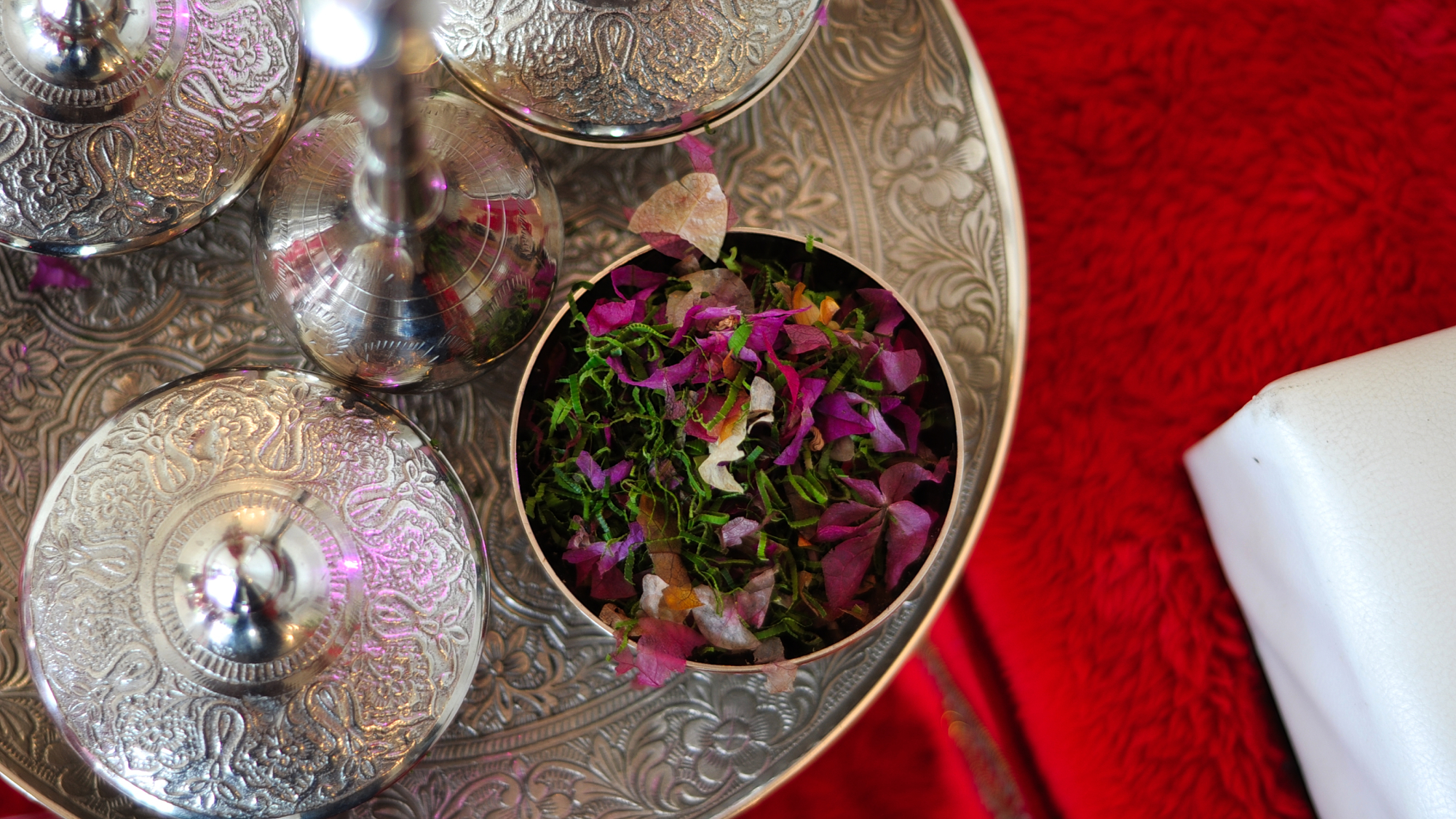 coloful flowers in silver detailed jar