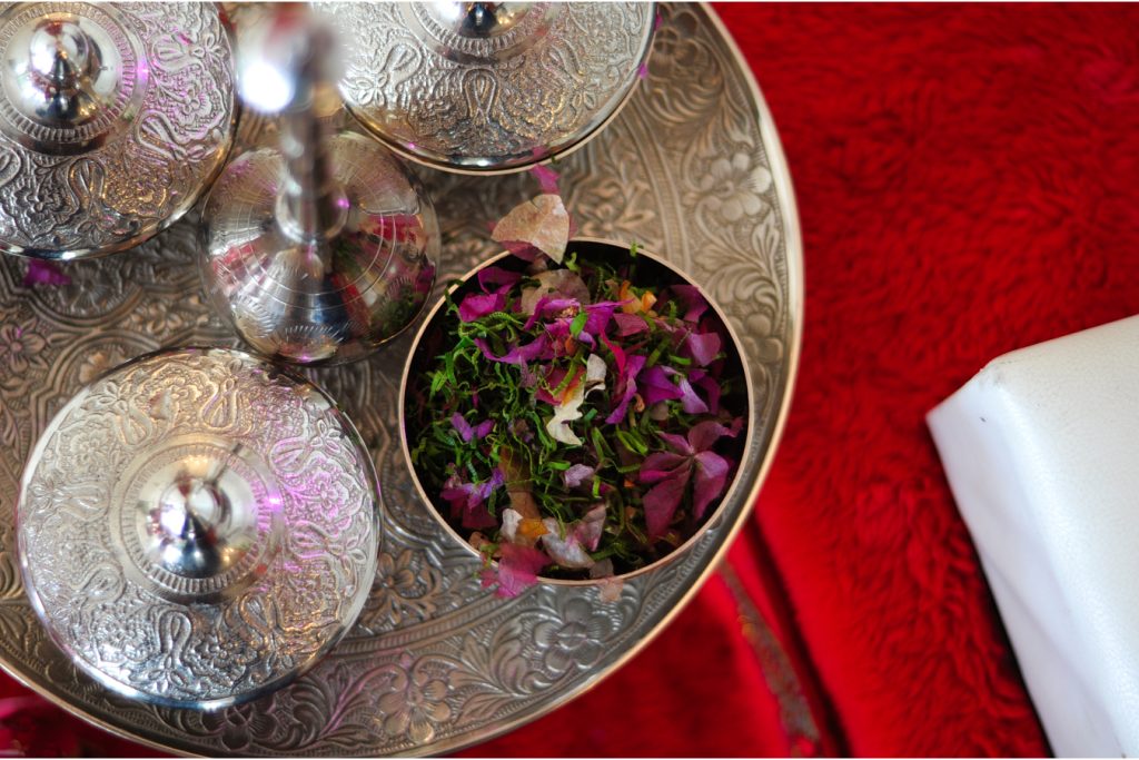 coloful flowers in silver detailed jar