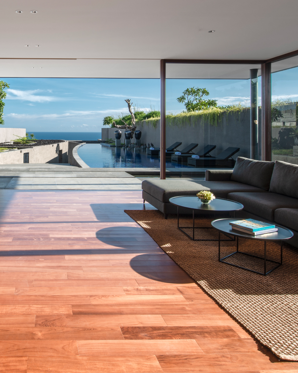 interior of two bedroom cliff edge villa with view of pool and ocean