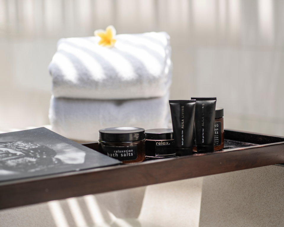 Towels and spa products on table