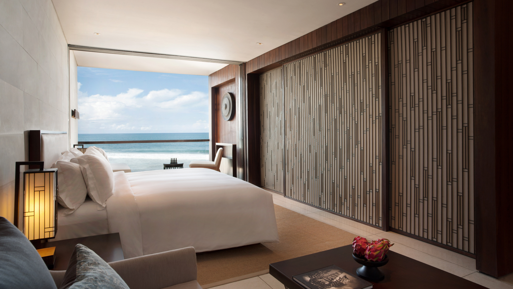 Bed with ocean view suite.