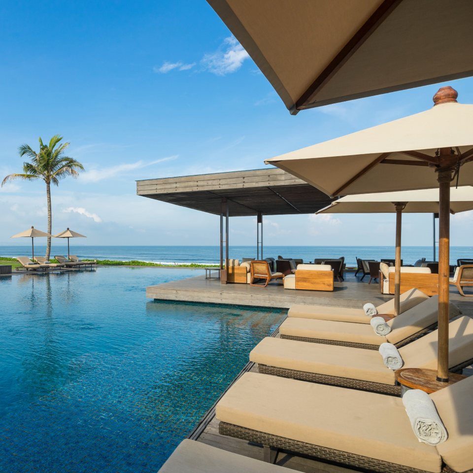 swimming pool with lounge chairs