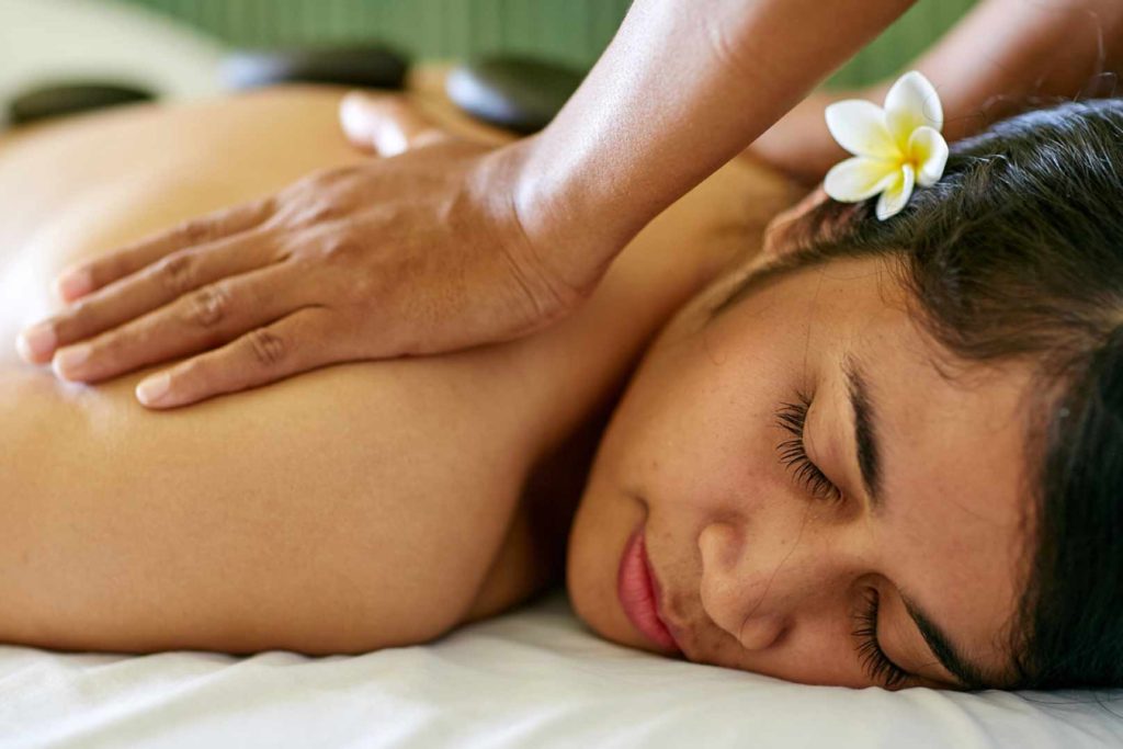 close up of woman receiving healing treatment