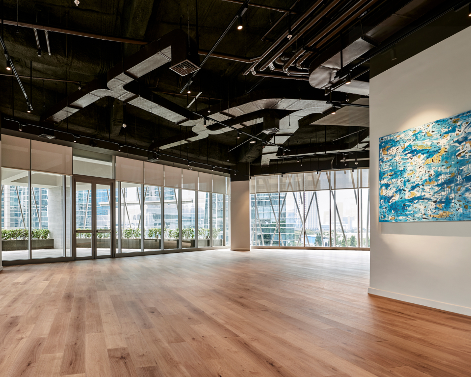 event gallery space with views of the city