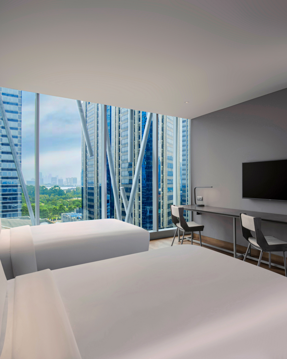 Interior of twin bed studio room with city views