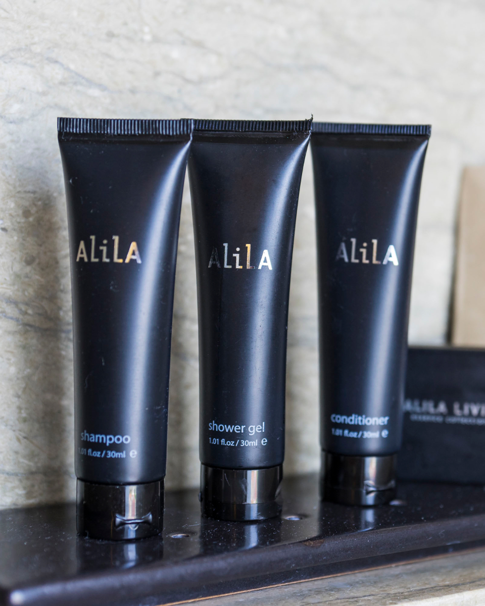 3 bottles of alila shower products